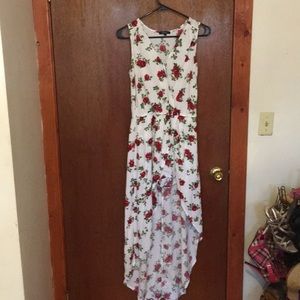 Wrap romper with high low skirt